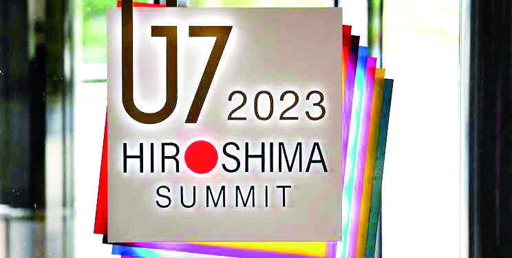 The G7 Summit logo is seen at the entrance of the International Media Center (IMC) ahead the G7 Leaders' Summit in Hiroshima on May 18, 2023. (Photo by LUDOVIC MARIN / AFP)