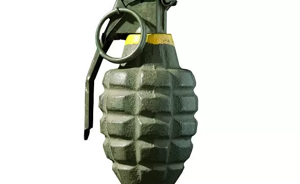 A hand grenade isolated on white.