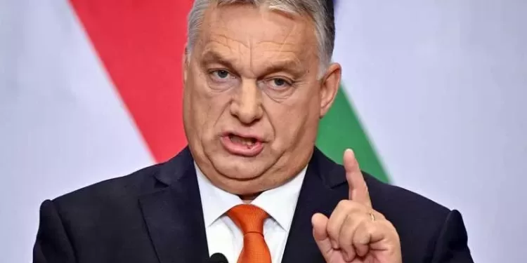 Hungarian Prime Minister Viktor Orban gestures as he addresses an annual press conference in Budapest on December 21, 2022, prior to the government's last meeting of the year 2022. (Photo by Attila KISBENEDEK / AFP)