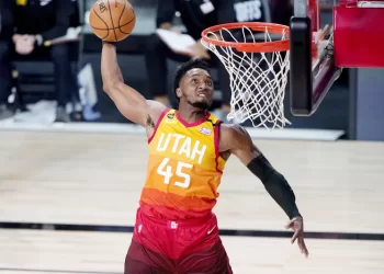 LAKE BUENA VISTA, FLORIDA - AUGUST 21: Donovan Mitchell #45 of the Utah Jazz dunks against the Denver Nuggets during the second half of Game Three of first round playoffs at the AdventHealth Arena at the ESPN Wide World Of Sports Complex on August 21, 2020 in Lake Buena Vista, Florida. NOTE TO USER: User expressly acknowledges and agrees that, by downloading and or using this photograph, User is consenting to the terms and conditions of the Getty Images License Agreement. (Photo by Ashley Landis-Pool/Getty Images)
