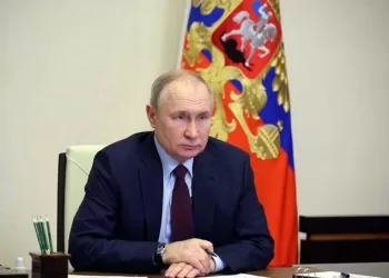 Russian President Vladimir Putin chairs a meeting with members of the government via a video conference at the Novo-Ogaryovo state residence, outside Moscow, on January 11, 2023. (Photo by Mikhail KLIMENTYEV / SPUTNIK / AFP)