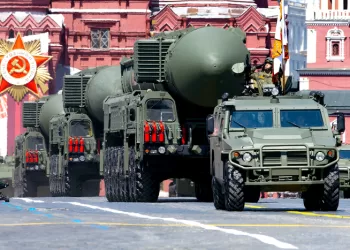 FILE - In this file photo taken on Wednesday, June 24, 2020, Russian RS-24 Yars ballistic missiles roll in Red Square during the Victory Day military parade marking the 75th anniversary of the Nazi defeat in Moscow, Russia. Russia and the United States exchanged documents Tuesday Jan. 26, 2021, to extend the New START nuclear treaty, their last remaining arms control pact, the Kremlin said. The Kremlin readout of a phone call between U.S. President Joe Biden and Russian President Vladimir Putin said they voiced satisfaction with the move. (AP Photo/Alexander Zemlianichenko, File)