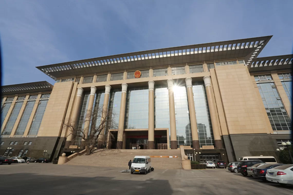 --FILE--View of China's Supreme People's Court (SPC) in Beijing, China, 4 December 2013.

China's Supreme People's Court (SPC) on Tuesday (26 February 2019) issued three documents to clarify and regulate judicial relief cases. The three documents, which are currently being trialed, clarify how courts will handle applications for judicial relief, decide the models of documents needed in these cases and set up the protocol for committees in charge of judicial relief within the courts. According to the documents, courts are instructed to increase the awareness of judicial relief among parties of lawsuits and the public. In 2018, about 57,500 people received judicial relief and about 1.08 billion yuan (160.68 million U.S. dollars) was granted, according to Liu Zhumei, a senior SPC official. The SPC plans to develop a database for judicial relief cases that links courts at all four levels and will push the legislative proceeding of law on judicial relief, Liu said.No Use China. No Use France.