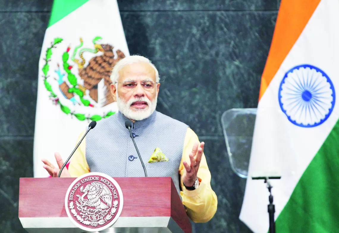 epa05352350 Indian Prime Minister Narendra Modi and Mexican President Enrique Pena Nieto (unseen) speak during a joint statement at Los Pinos presidential house in Mexico City, Mexico, 08 June 2016. Modi is on a one-day working visit to Mexico to discuss the strengthening of commerce, investments and bilateral cooperation.  EPA/MARIO GUZMAN