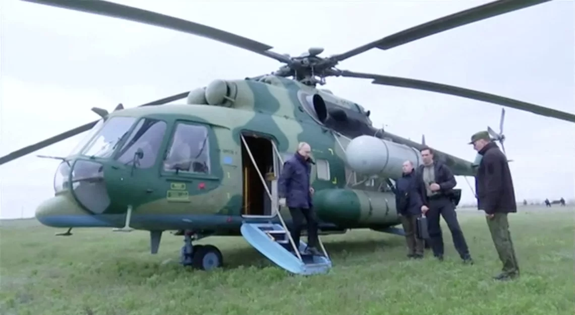 Russian President Vladimir Putin disembarks a helicopter as he visits the headquarters of the "Dnieper" army group in the Kherson Region, Russian-controlled Ukraine, in this still image taken from handout video released on April 18, 2023. Kremlin.ru/Handout via REUTERS ATTENTION EDITORS - THIS IMAGE WAS PROVIDED BY A THIRD PARTY. NO RESALES. NO ARCHIVES. MANDATORY CREDIT.