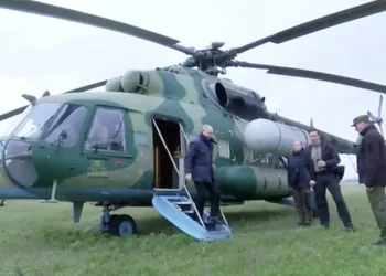 Russian President Vladimir Putin disembarks a helicopter as he visits the headquarters of the "Dnieper" army group in the Kherson Region, Russian-controlled Ukraine, in this still image taken from handout video released on April 18, 2023. Kremlin.ru/Handout via REUTERS ATTENTION EDITORS - THIS IMAGE WAS PROVIDED BY A THIRD PARTY. NO RESALES. NO ARCHIVES. MANDATORY CREDIT.