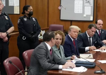 NEW YORK, NEW YORK - APRIL 04: Former U.S. President Donald Trump sits at the defense table with his defense team in a Manhattan court during his arraignment on April 4, 2023, in New York City. Trump was arraigned during his first court appearance today following an indictment by a grand jury that heard evidence about money paid to adult film star Stormy Daniels before the 2016 presidential election. With the indictment, Trump becomes the first former U.S. president in history to be charged with a criminal offense.   Seth Wenig-Pool/Getty Images/AFP (Photo by POOL / GETTY IMAGES NORTH AMERICA / Getty Images via AFP)