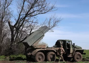 Ukrainian artillerymen prepare a BM-21 Grad multiple rocket launcher to fire towards Russian positions on the frontline, in Donetsk region on April 17, 2023. (Photo by Anatolii Stepanov / AFP)