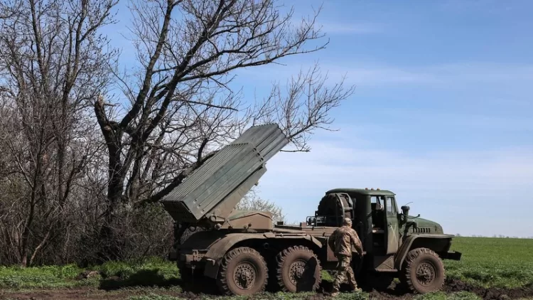 Ukrainian artillerymen prepare a BM-21 Grad multiple rocket launcher to fire towards Russian positions on the frontline, in Donetsk region on April 17, 2023. (Photo by Anatolii Stepanov / AFP)