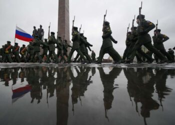 Russian army soldiers attend an event marking the 80th anniversary of the break of Nazi's siege of Leningrad, (now St. Petersburg) during World War II at the monument of the Heroic Defenders of Leningrad, in St. Petersburg, Russia, Wednesday, Jan. 18, 2023. The Red Army broke the nearly 900-day blockade of the city on January 18, 1943 after fierce fighting. (AP Photo/Dmitri Lovetsky)