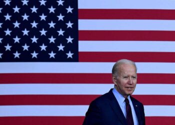 (FILES) US President Joe Biden arrives to deliver remarks during a visit to United Performance Metals, a specialty metals solutions center, in Hamilton, Ohio, on May 6, 2022. - President Joe Biden announced on April 25, 2023 he is running for re-election in 2024, plunging at the record age of 80 into a ferocious new White House campaign "to finish the job." (Photo by OLIVIER DOULIERY / AFP)