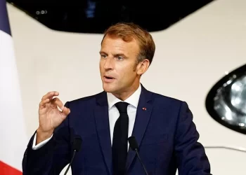 French President Emmanuel Macron delivers a speech next to a life-size replica of the next TGV high-speed train at the Gare de Lyon railway station, on September 17, 2021 in Paris, during a ceremony marking the 40th anniversary of French TGV high speed train. - On 22 September 1981, the first Train à Grand Vitesse line from Paris to Lyon opened to the public. (Photo by Michel Euler / POOL / AFP)