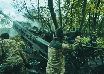 Ukrainian soldiers fire at Russian positions from a U.S.-supplied M777 howitzer in Ukraine's eastern Donetsk region Sunday, Oct. 23, 2022. (AP Photo/LIBKOS)
