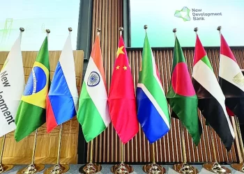 Flags are seen displayed at the opening ceremony of the New Development Bank Eighth Annual Meeting in Shanghai on May 30, 2023. (Photo by AFP) / China OUT