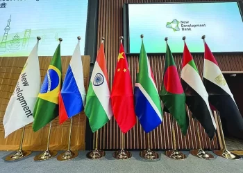 Flags are seen displayed at the opening ceremony of the New Development Bank Eighth Annual Meeting in Shanghai on May 30, 2023. (Photo by AFP) / China OUT
