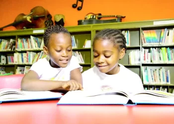 Students in School Library --- Image by © Brian Summers/First Light/Corbis