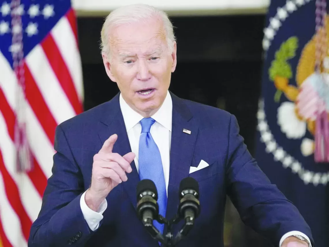 U.S. President Joe Biden speaks about the country's fight against the coronavirus disease (COVID-19) at the White House in Washington, U.S., December 21, 2021. REUTERS/Kevin Lamarque