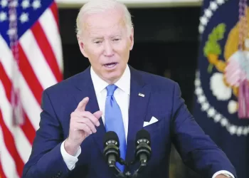 U.S. President Joe Biden speaks about the country's fight against the coronavirus disease (COVID-19) at the White House in Washington, U.S., December 21, 2021. REUTERS/Kevin Lamarque