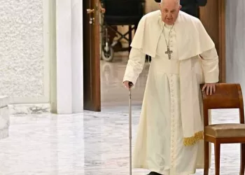 Pope Francis arrives for the weekly general audience in Paul-VI hall at the Vatican on December 13, 2023. (Photo by Andreas SOLARO / AFP)