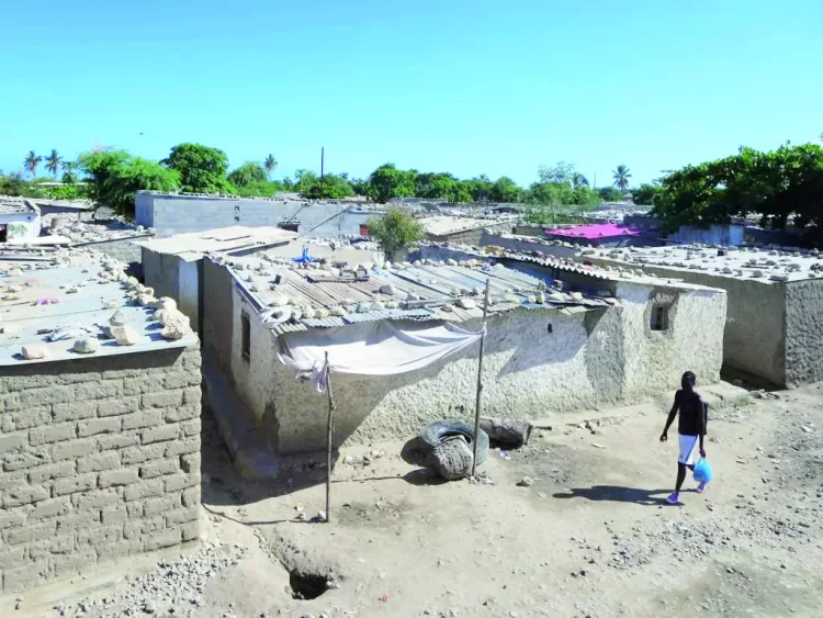Ramshackle bairros like this one in Benguela surround most towns and cities in Angola.