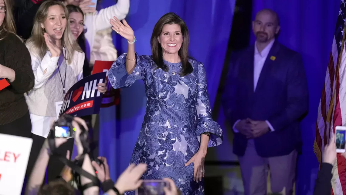 Republican presidential candidate former UN Ambassador Nikki Haley waves to the audience as she takes the stage to speak at a New Hampshire primary night rally, in Concord, N.H., Tuesday Jan. 23, 2024. (AP Photo/Steven Senne)