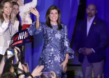 Republican presidential candidate former UN Ambassador Nikki Haley waves to the audience as she takes the stage to speak at a New Hampshire primary night rally, in Concord, N.H., Tuesday Jan. 23, 2024. (AP Photo/Steven Senne)