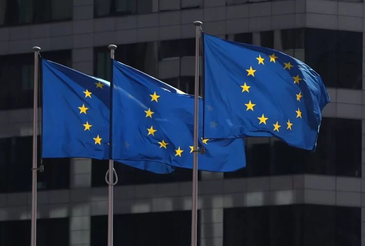 FILE PHOTO: European Union flags fly outside the European Commission headquarters in Brussels, Belgium, April 10, 2019. REUTERS/Yves Herman/File Photo
