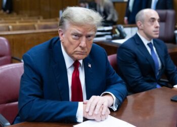 Former US President Donald Trump attends the first day of his trial for allegedly covering up hush money payments linked to extramarital affairs, at Manhattan Criminal Court in New York City on April 15, 2024. Donald Trump is in court Monday as the first US ex-president ever to be criminally prosecuted, a seismic moment for the United States as the presumptive Republican nominee campaigns to re-take the White House. The scandal-plagued 77-year-old is accused of falsifying business records in a scheme to cover up an alleged sexual encounter with adult film actress Stormy Daniels to shield his 2016 election campaign from adverse publicity. (Photo by JEENAH MOON / POOL / AFP)